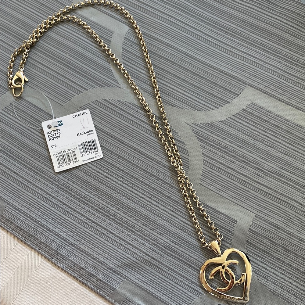 NWT 2022 CHANEL Gold Necklace with Heart and CC Pendant
